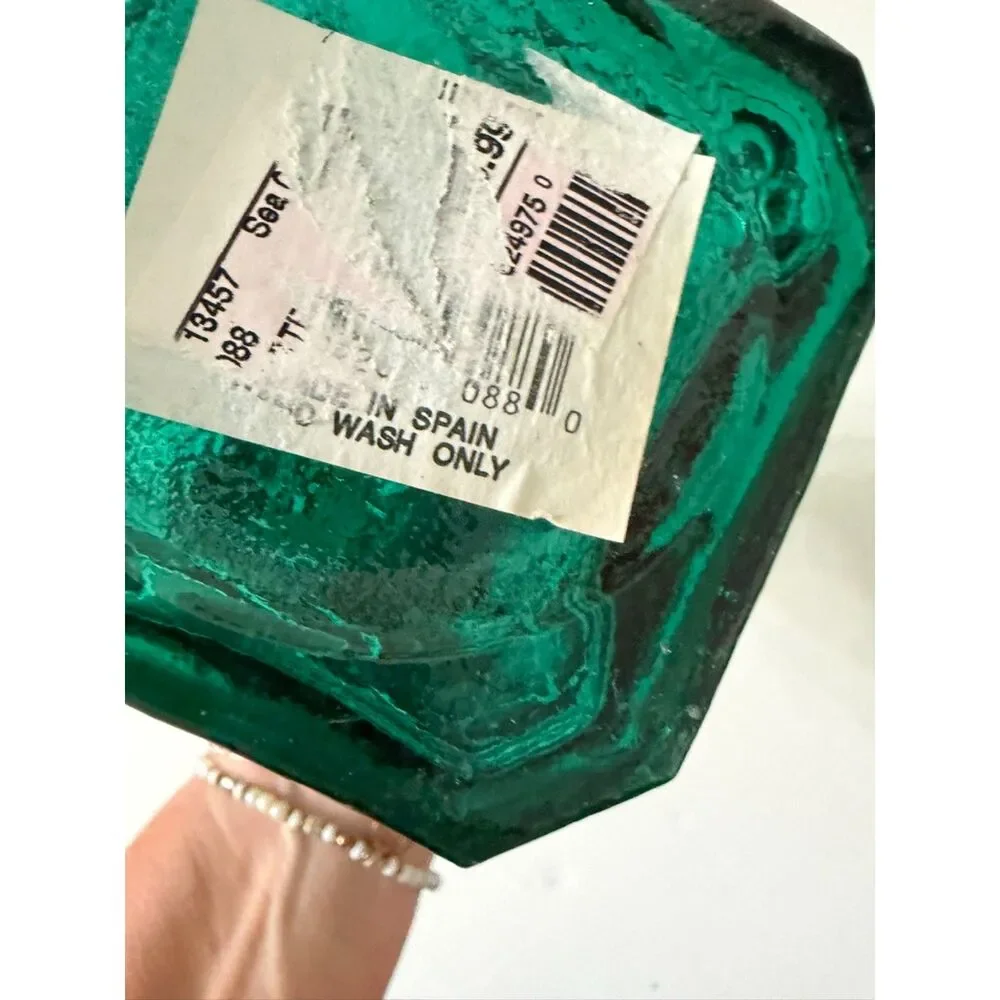 vtg emerald green glass decanter bottle with embossed sides and cork stopper
